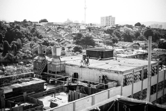 The TELERJ favela was founded by 5,000 people in a set of abandoned buildings a few miles from Maracanã stadium in Rio de Janeiro, in March 2014. They were forcibly evicted by the government in April. Photo courtesy of Mídia NINJA CC BY-NC-SA 2.0